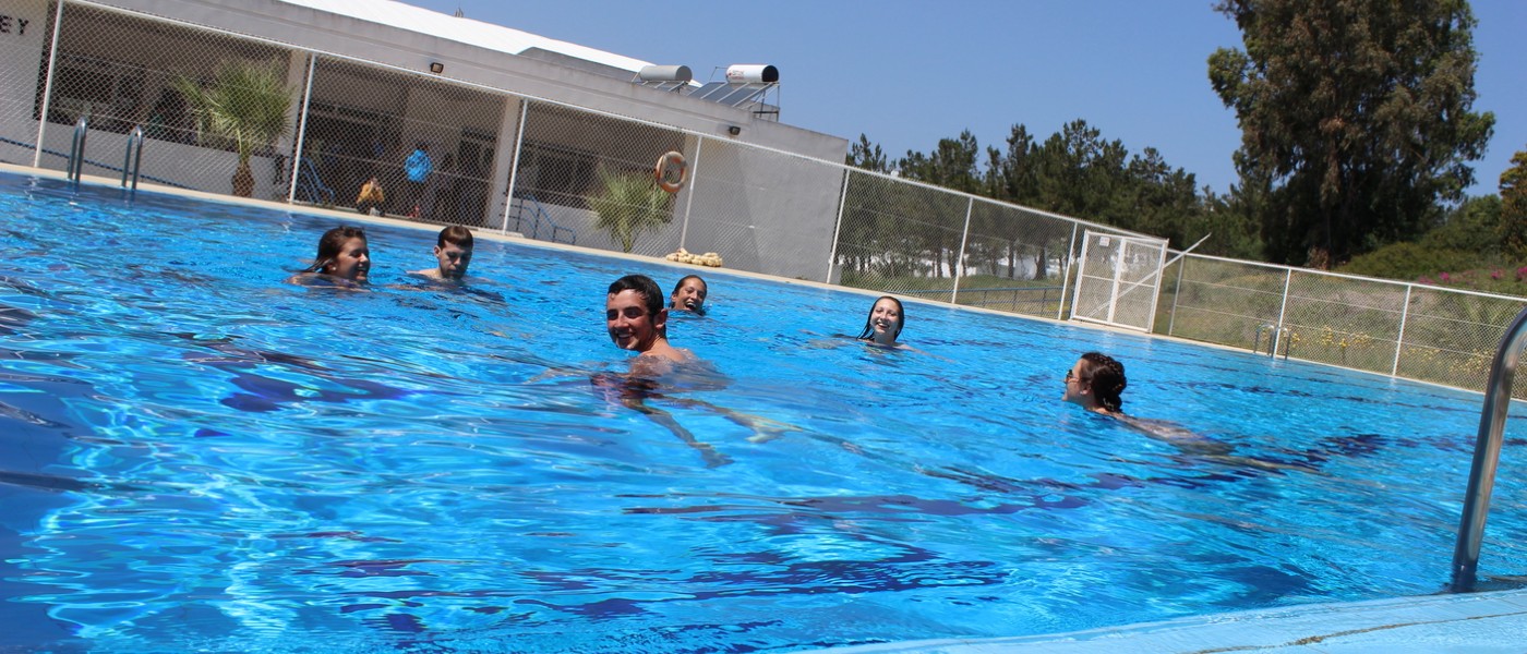 ֱ Students swimming at the pool at the American School of Tangier